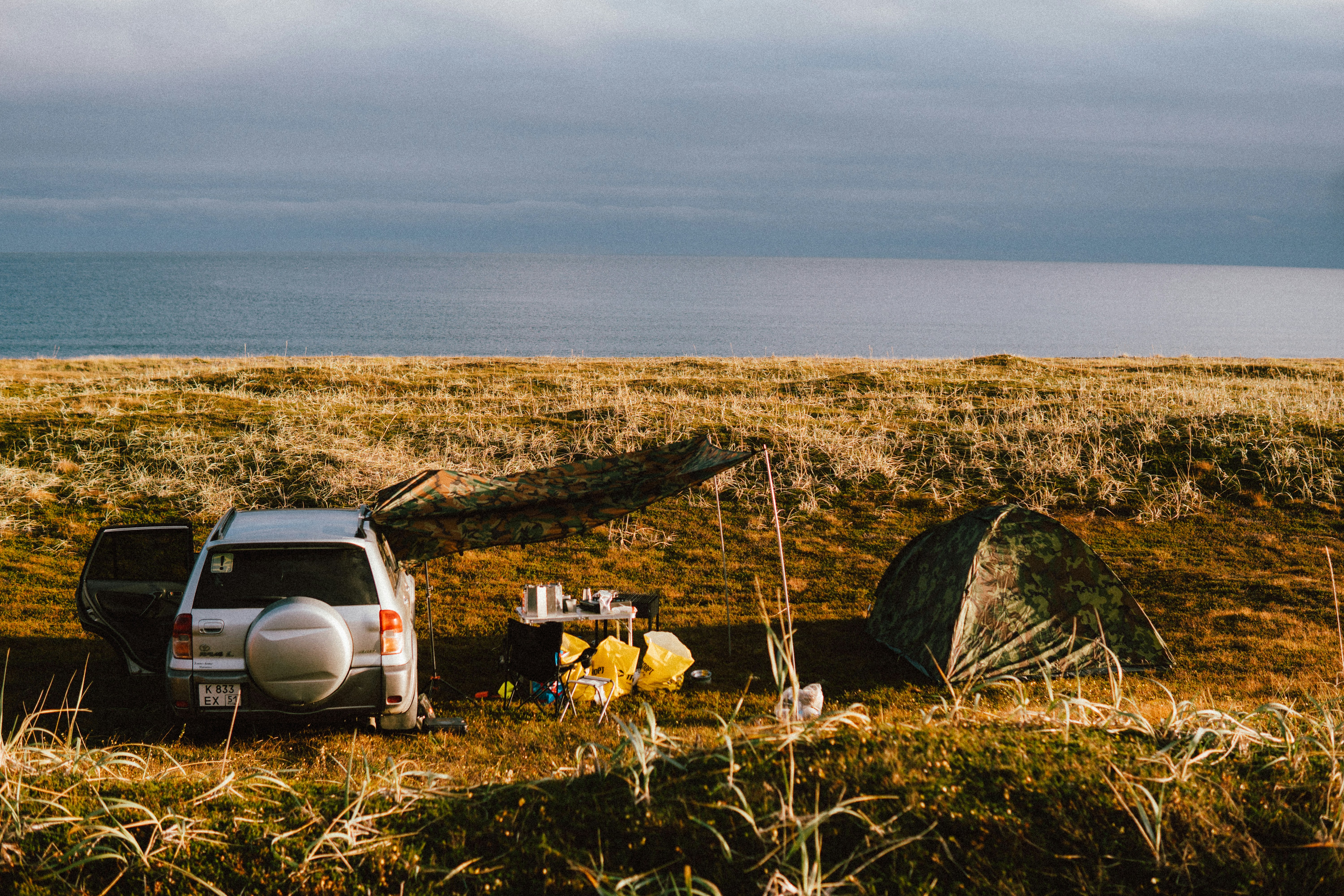 a car parked on a beach