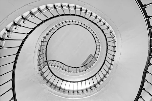 a spiral staircase with a spiral staircase