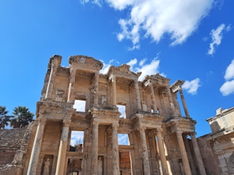 a building with columns and a blue sky
