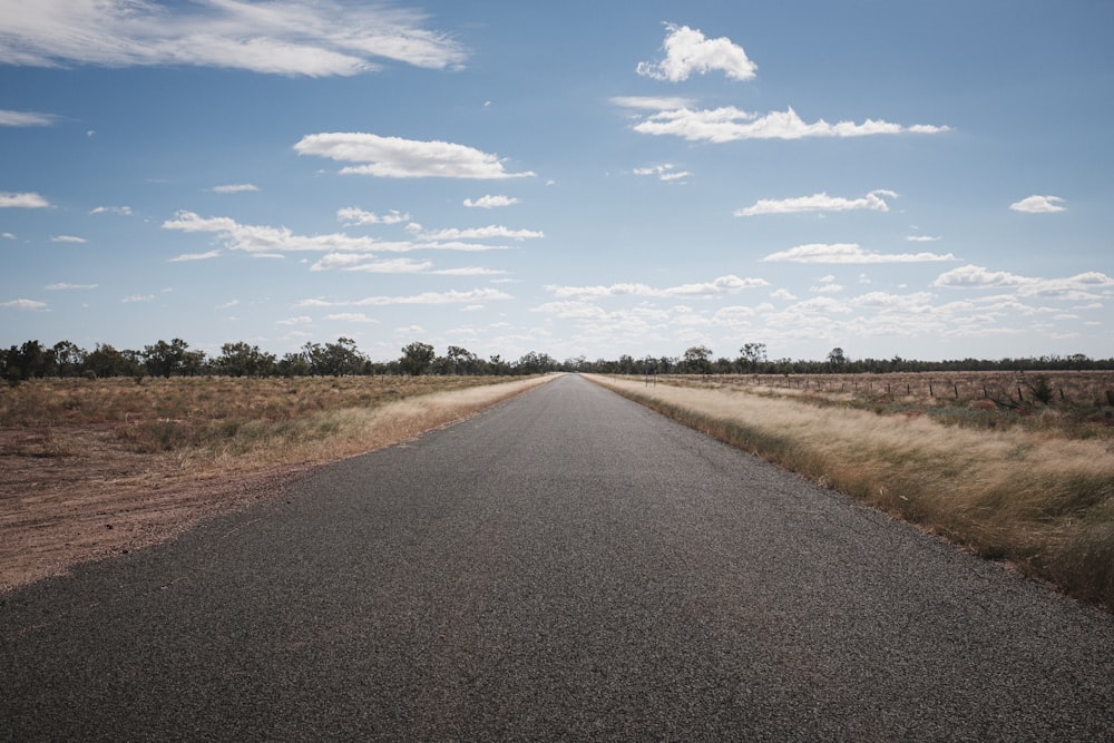 a road with grass on the side