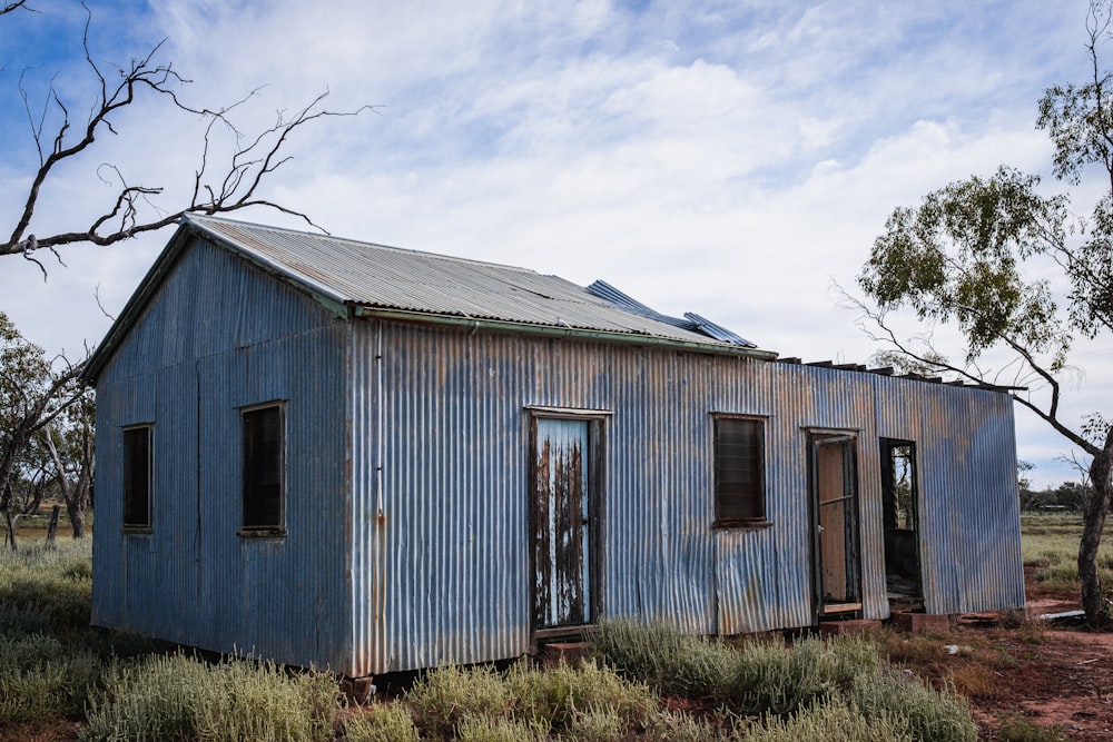 a blue house with windows