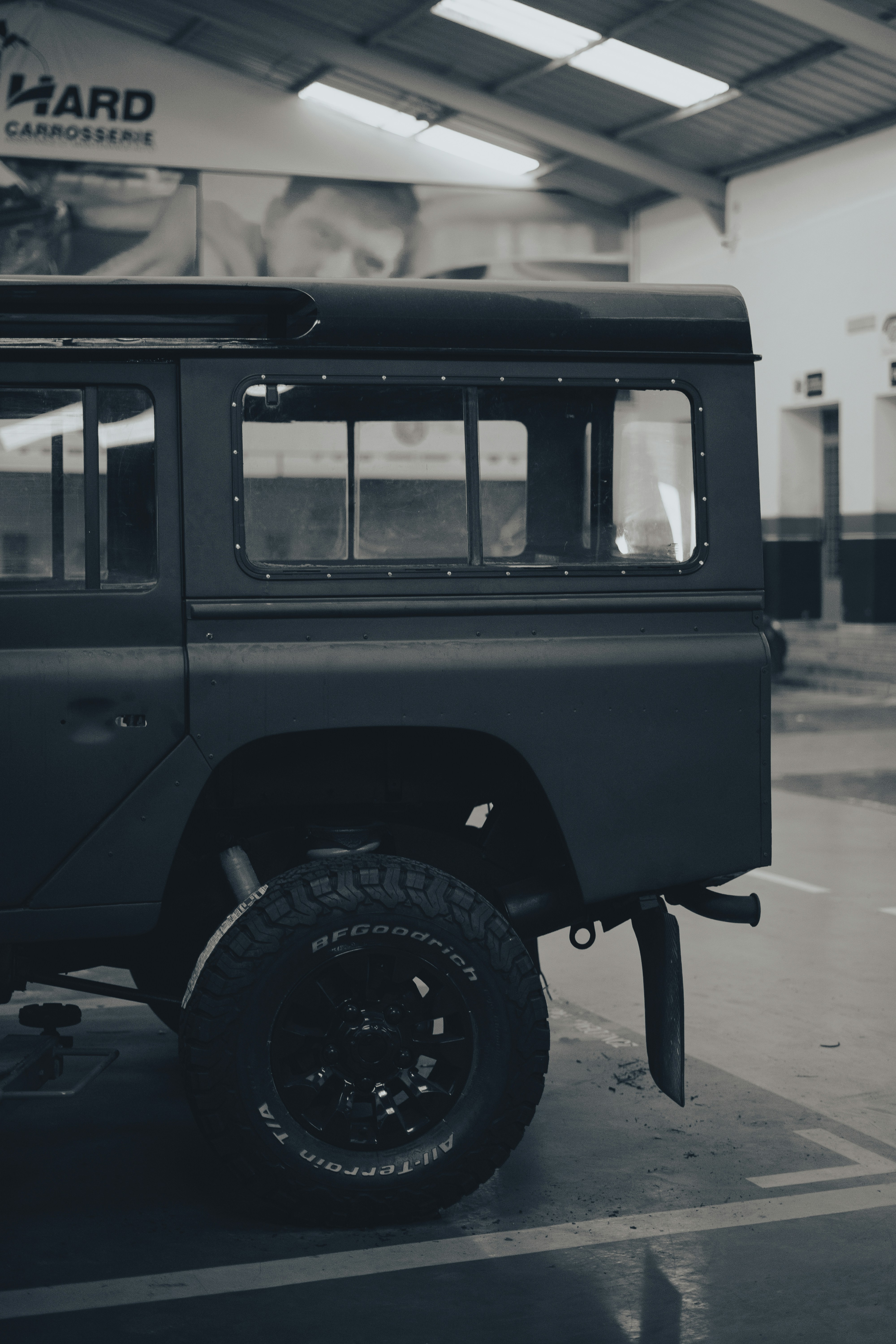 a black vehicle parked in a building