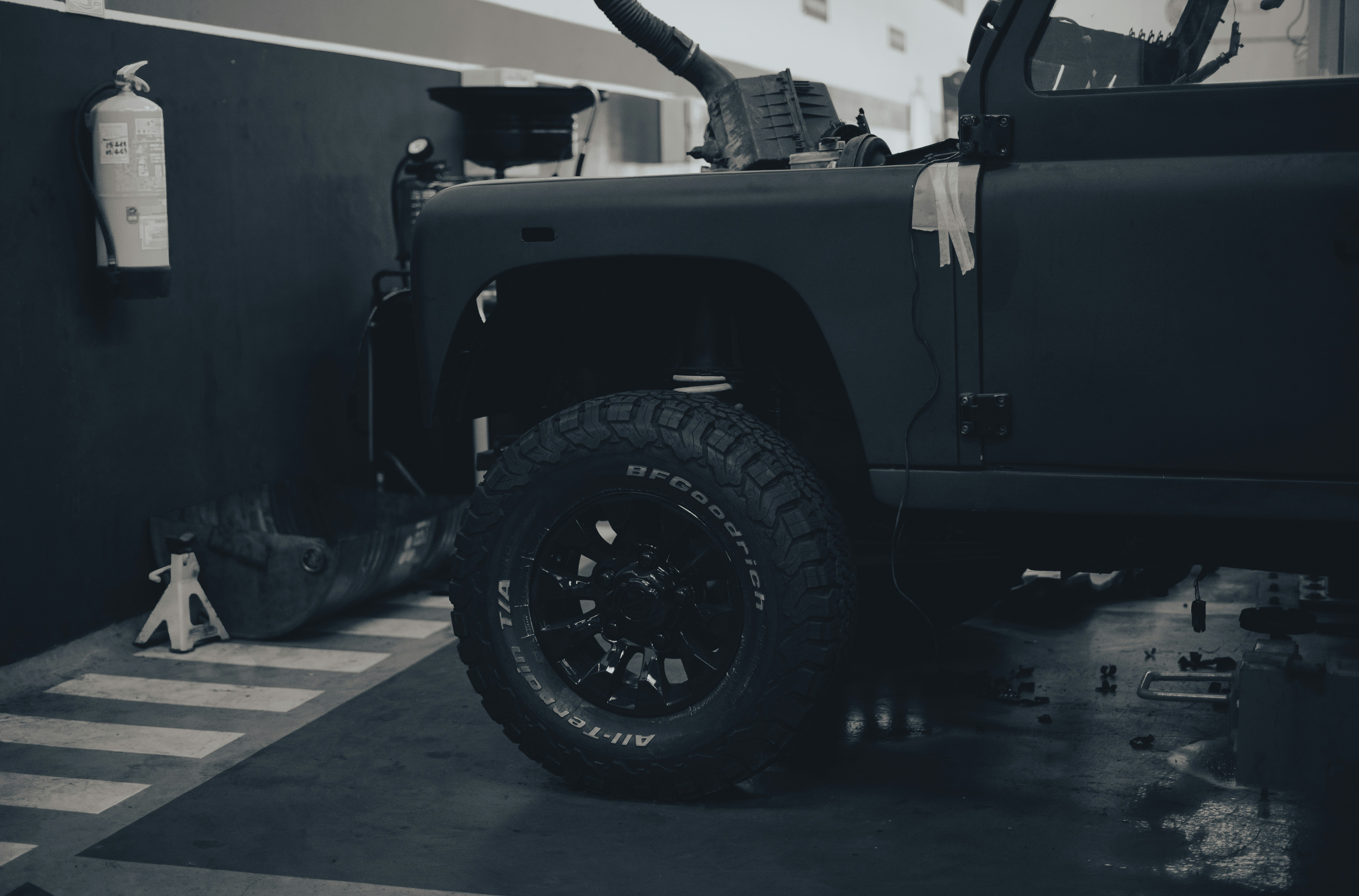 a black car with a gun on the back