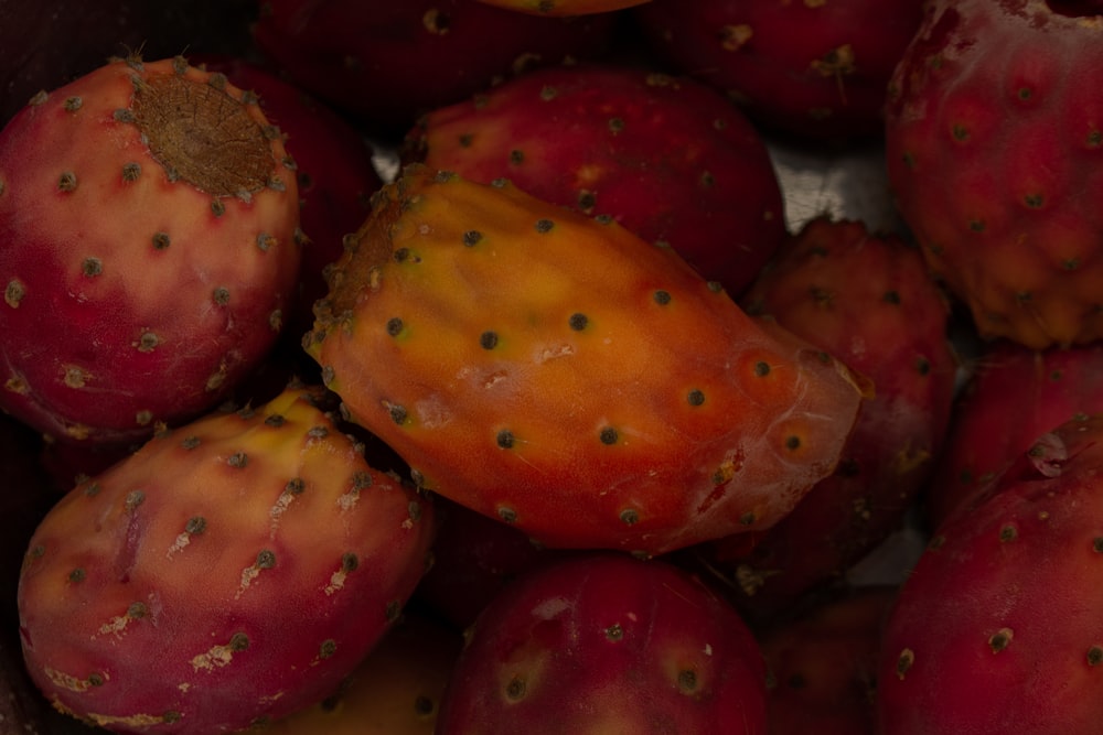 a pile of red strawberries