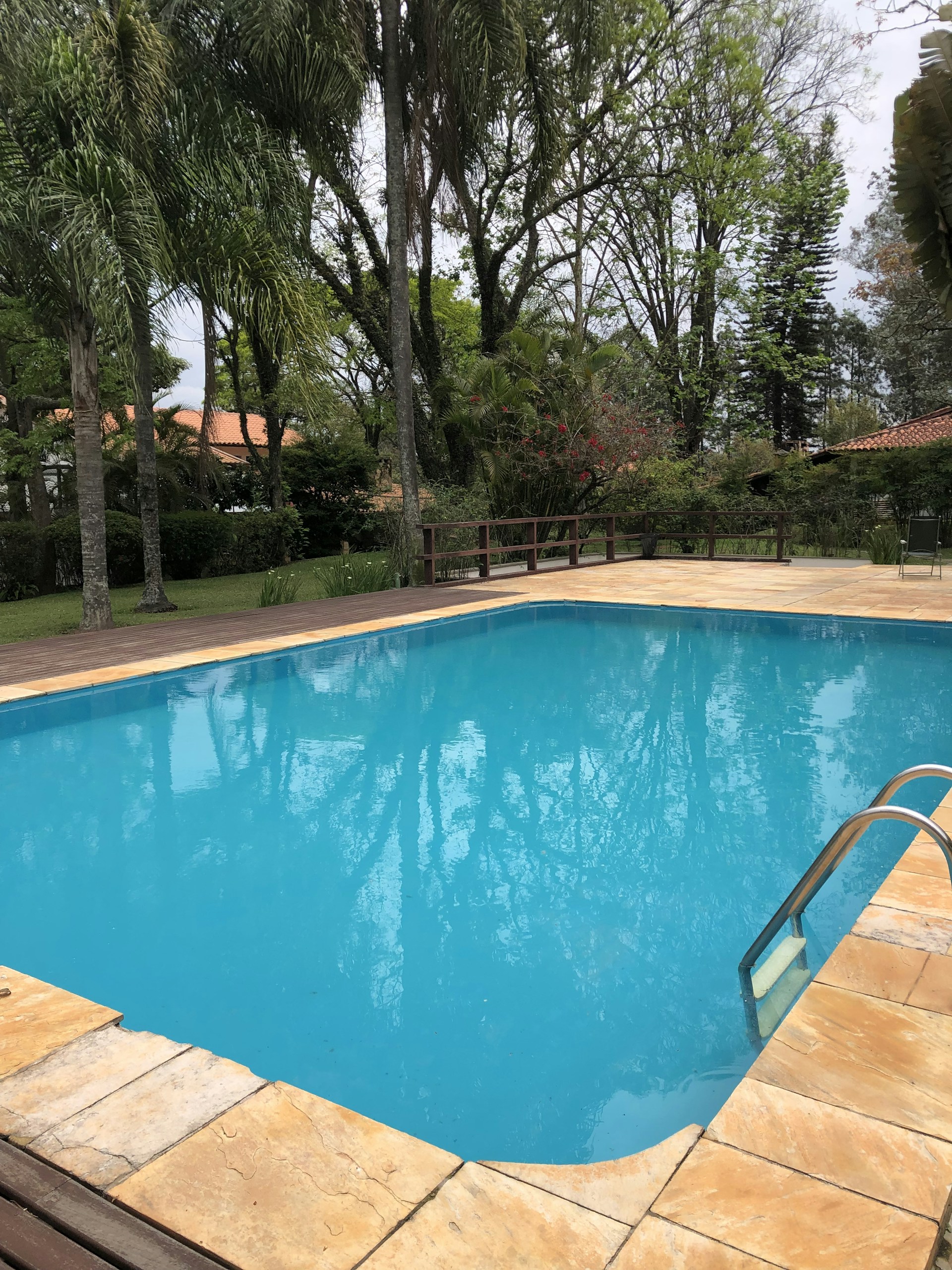 woman wearing yellow long-sleeved dress under white clouds and blue sky during daytime