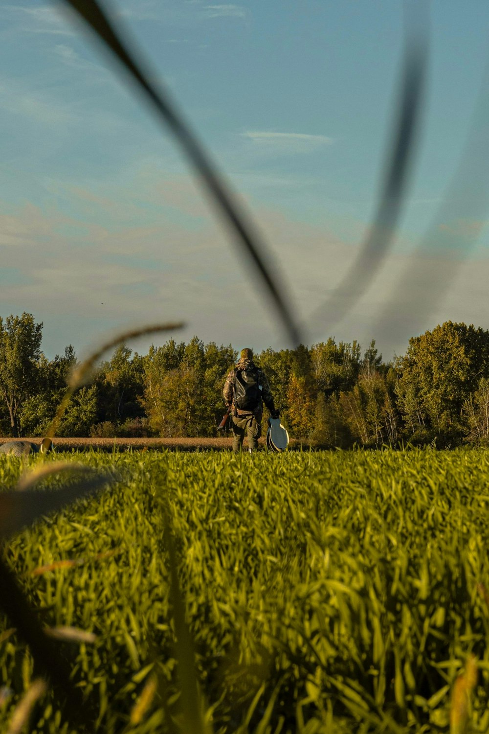 a person riding a bike on a field