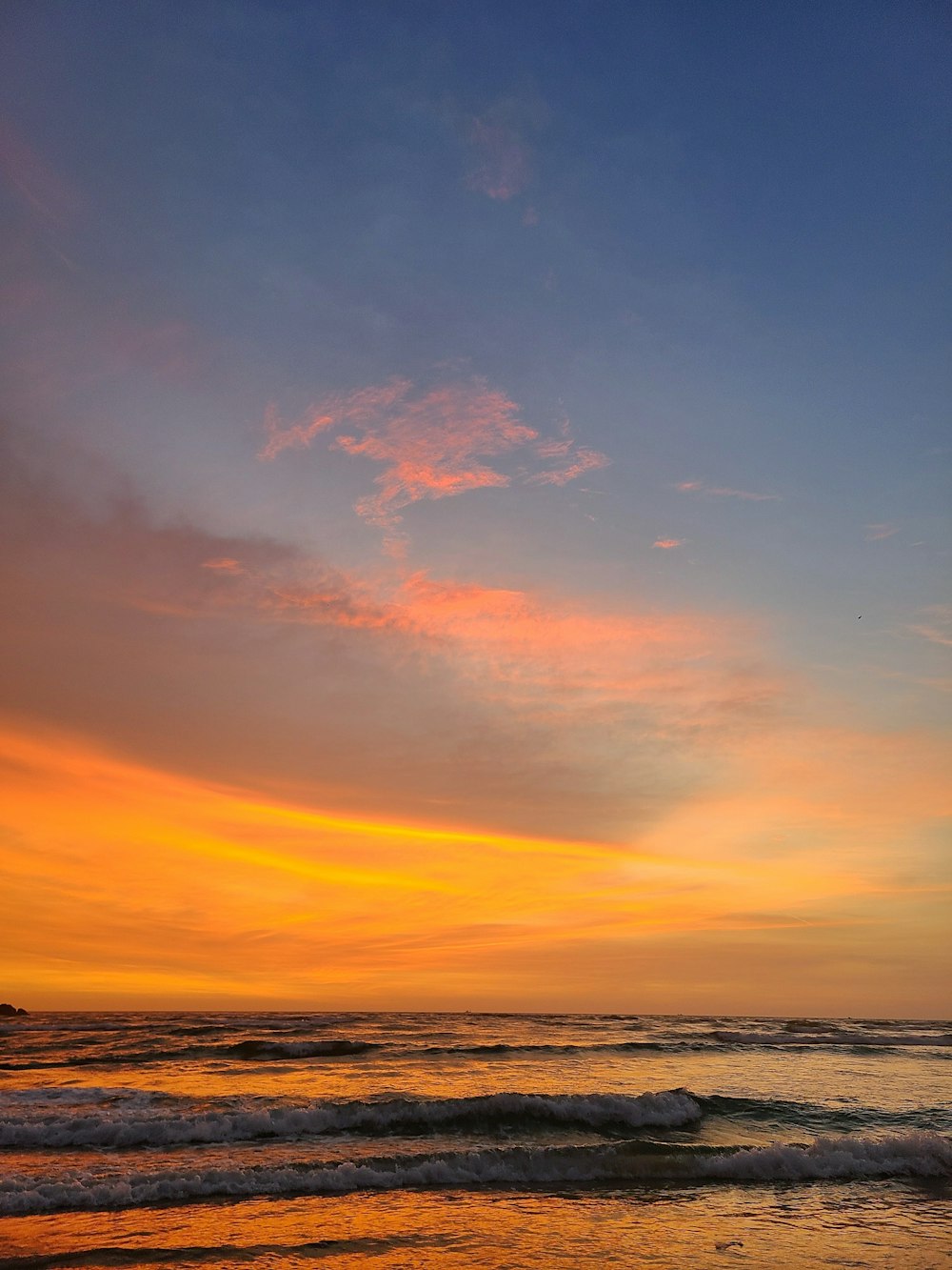 a sunset over the ocean