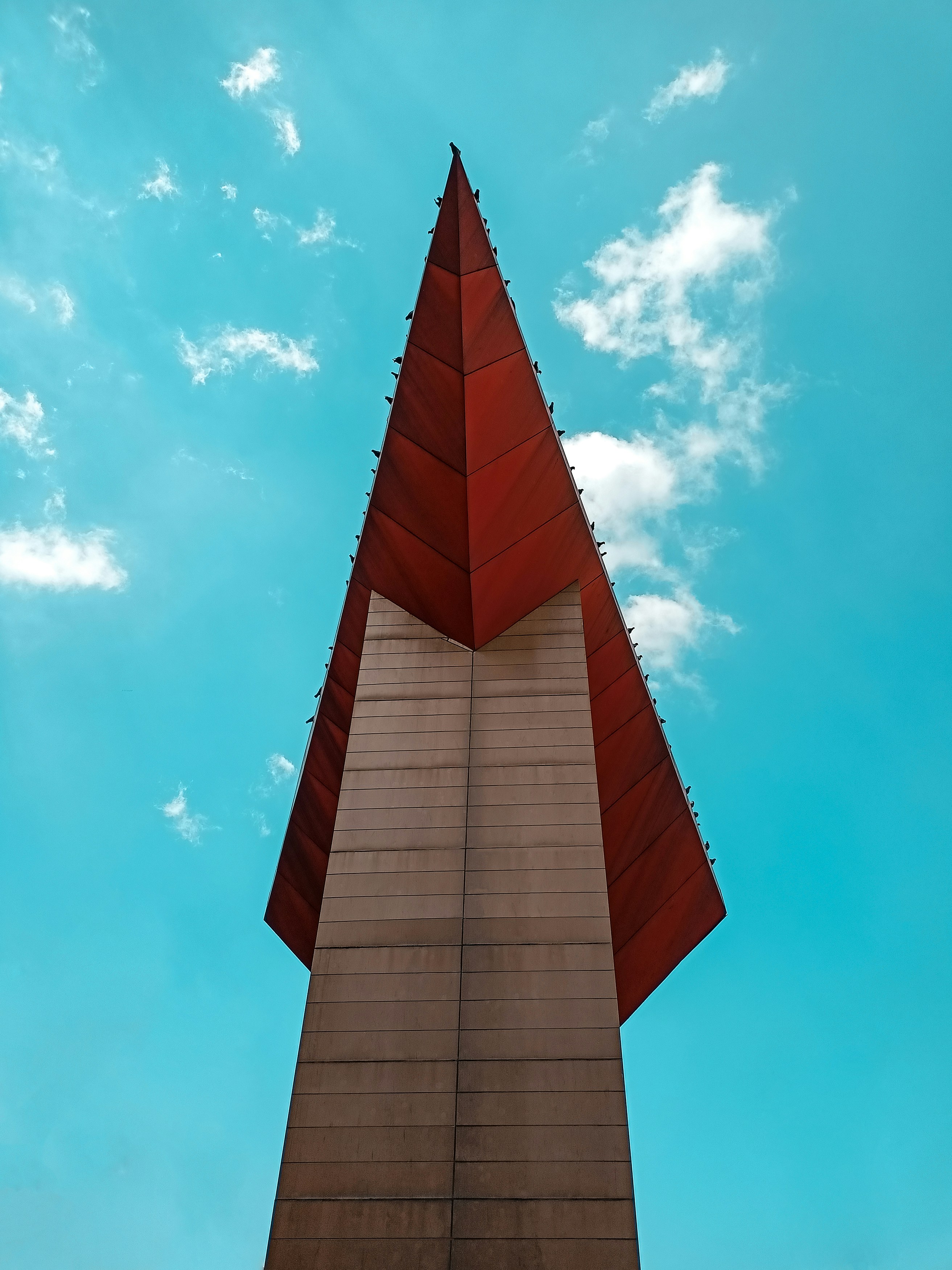 a tall tower with a pointed top