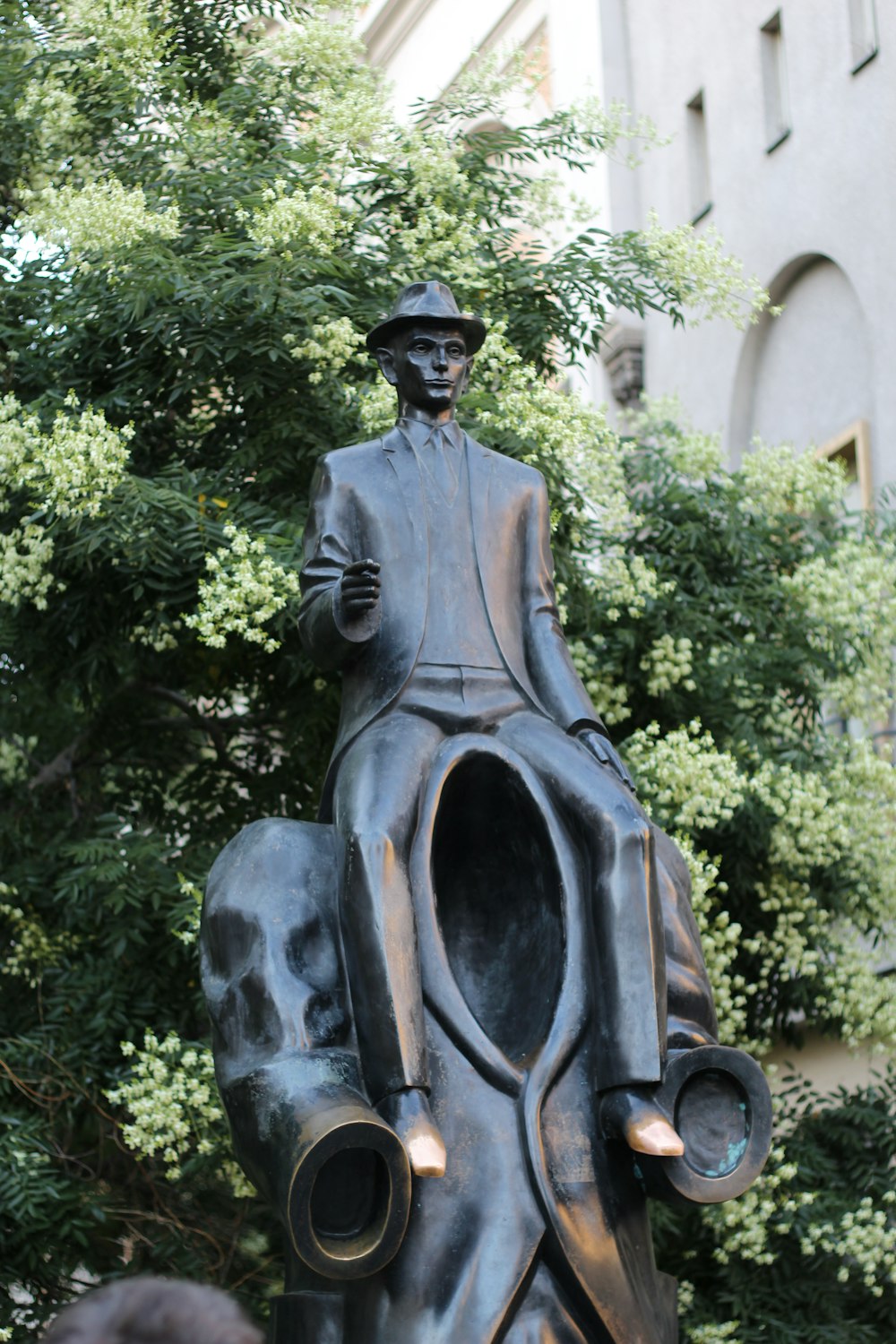 a statue of a person riding a horse