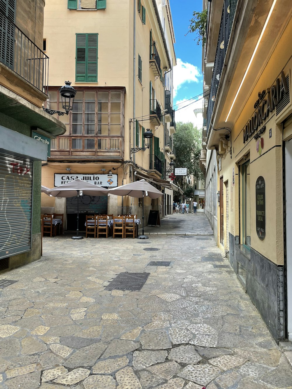 a street with tables and chairs on it