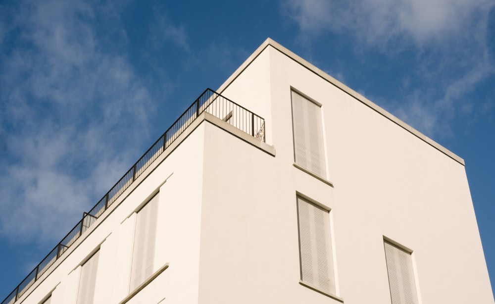 a white building with a railing
