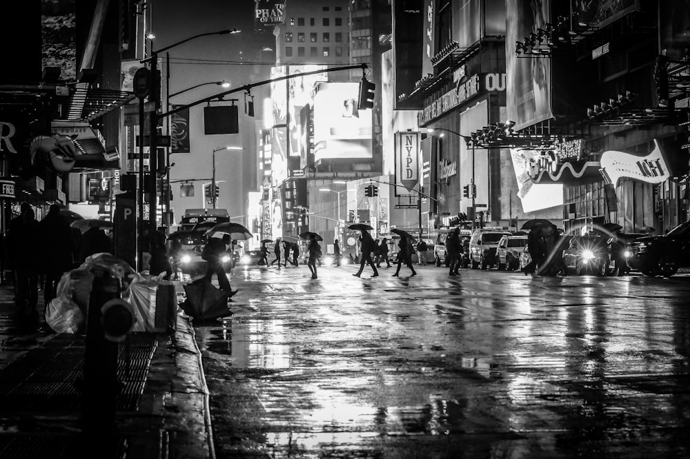 people walking in the rain