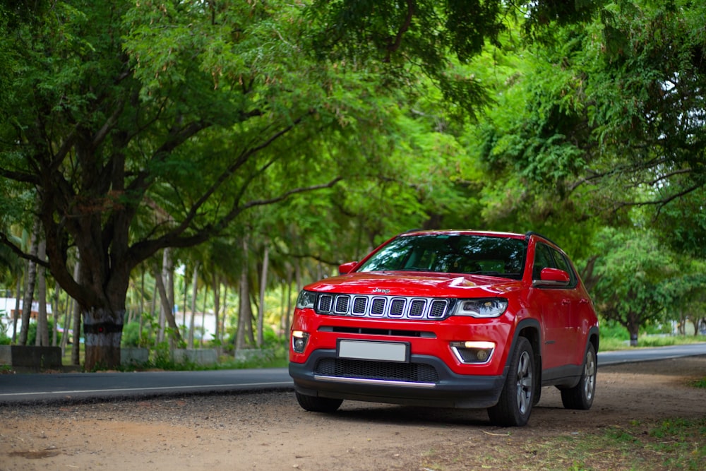 a red car parked on a road