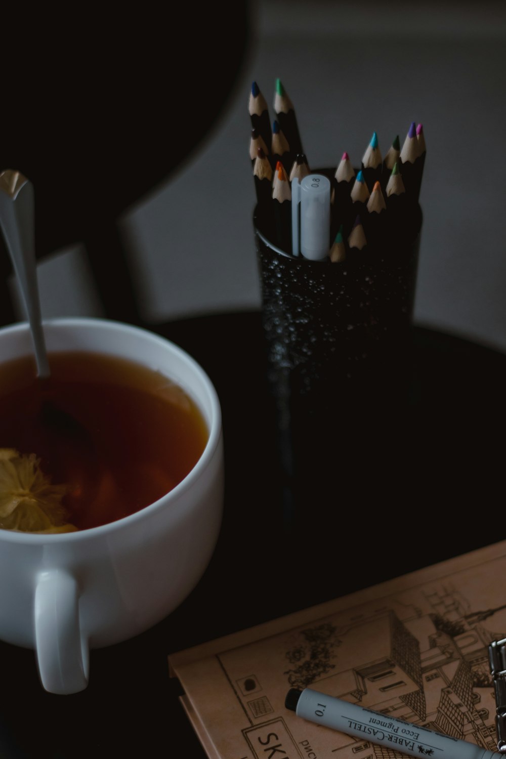 a cup of tea with a spoon