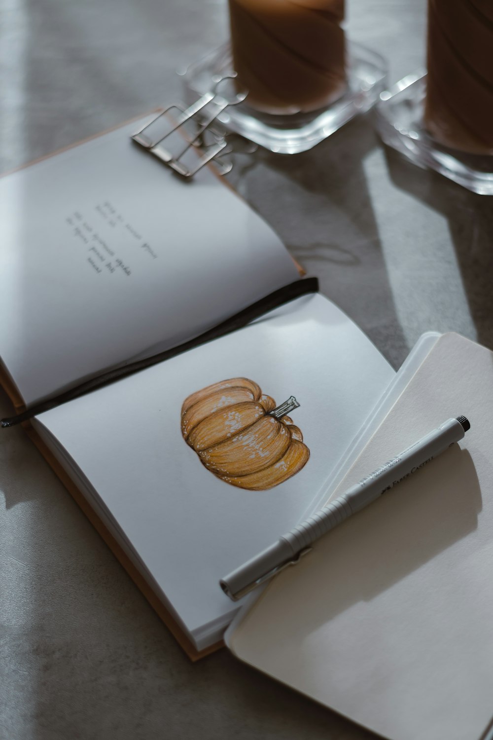 a gold and silver ring on a white napkin on a table