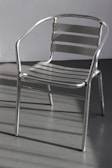 Finished metal furniture piece with clean lines and a polished finish in natural light