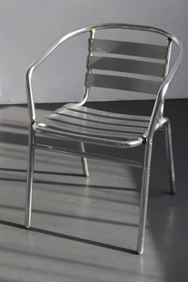 Modern metal furniture piece with sleek black finish, blending style and durability.