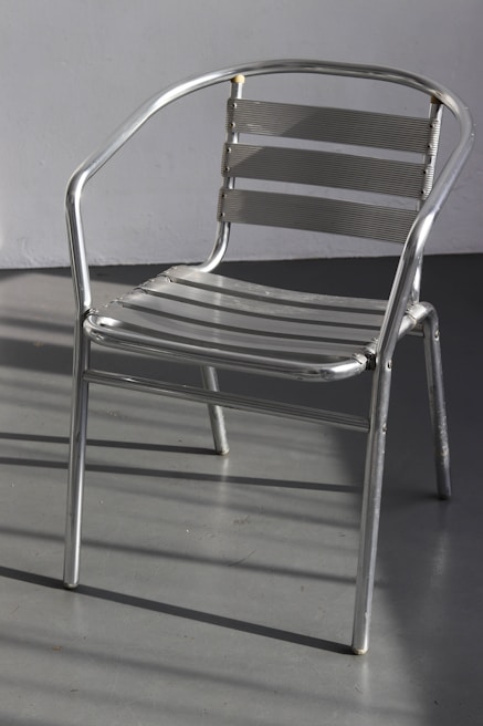 A modern metal chair showcasing sleek design.