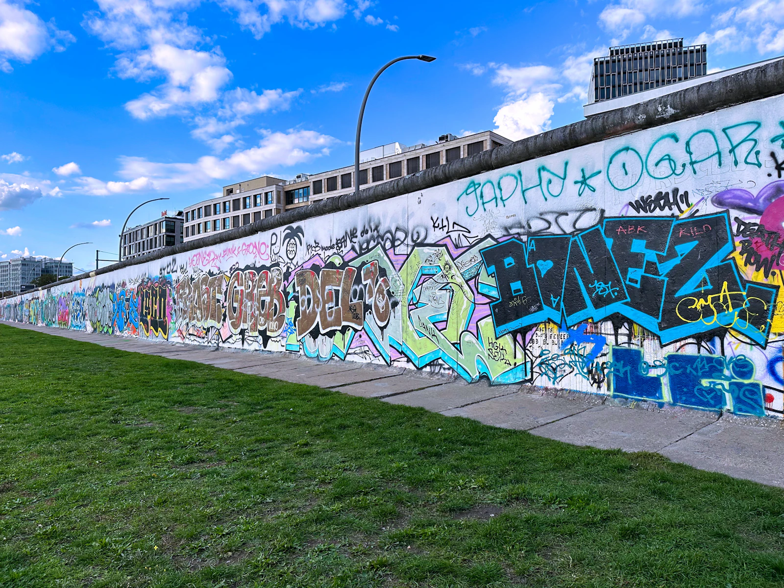 Surviving section of the Berlin Wall at the East Side Gallery in Berlin, painted with commemorative murals