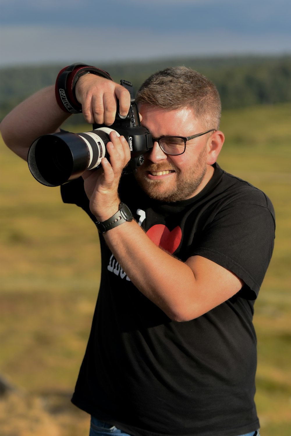 a man holding a camera