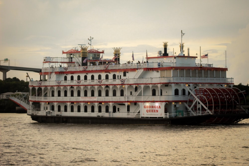 a large white boat on water