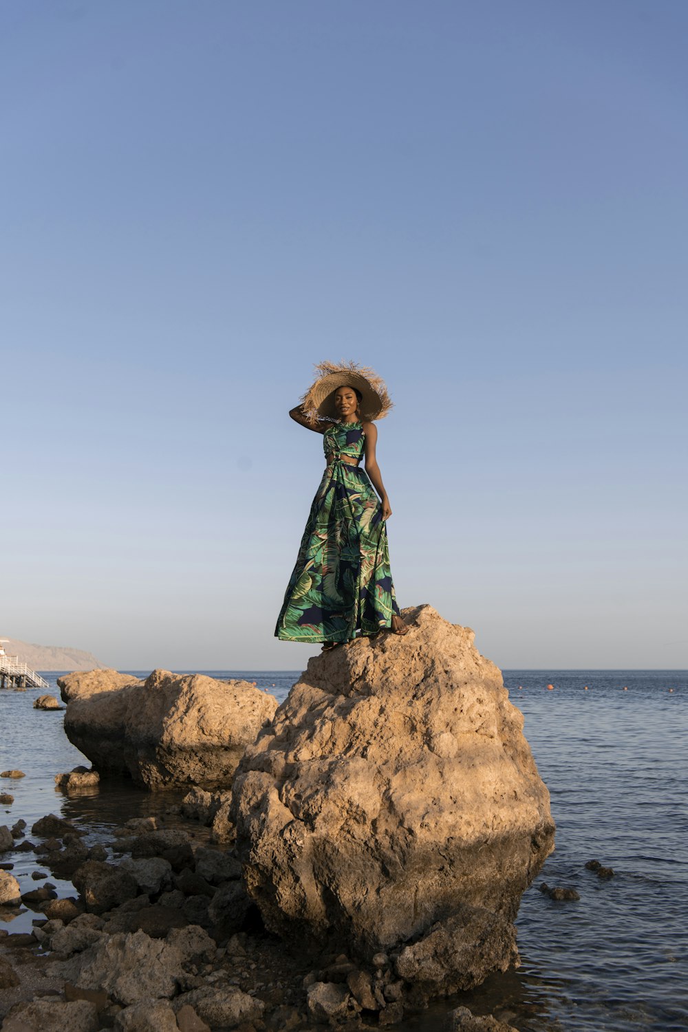 a person standing on a rock