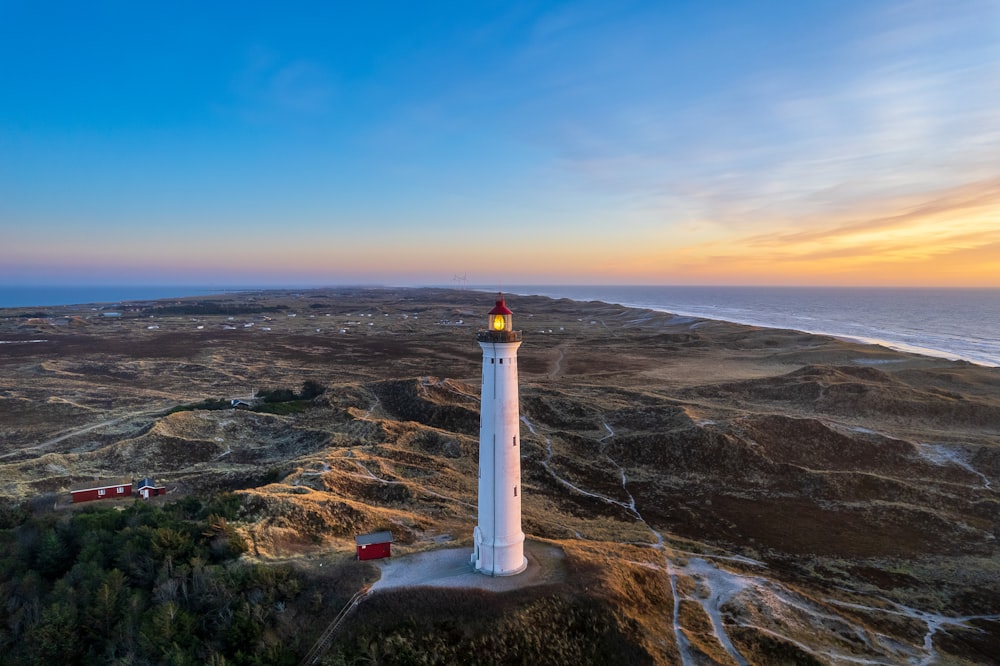 a lighthouse on a hill