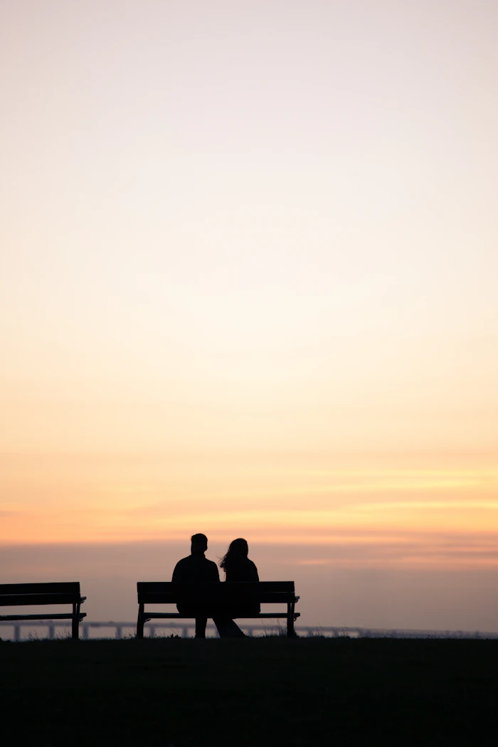 seventh day adventist dating sites free – couple talking on a bench at sunset