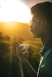 a man holding a can