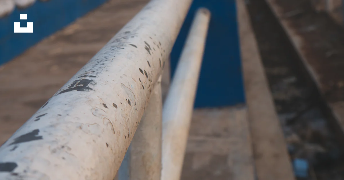 A row of blue metal railings photo – Free Handrail Image on Unsplash