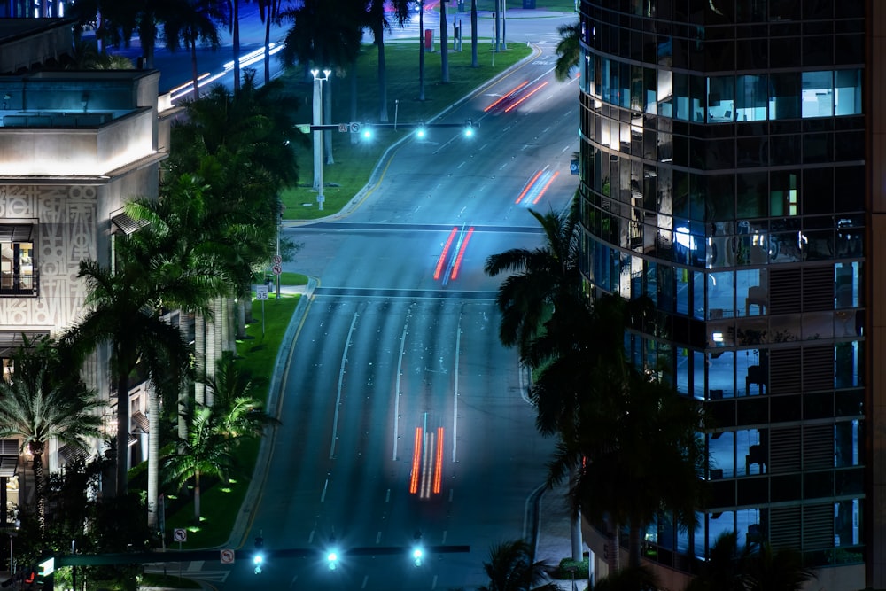 a street with cars on it and buildings around it