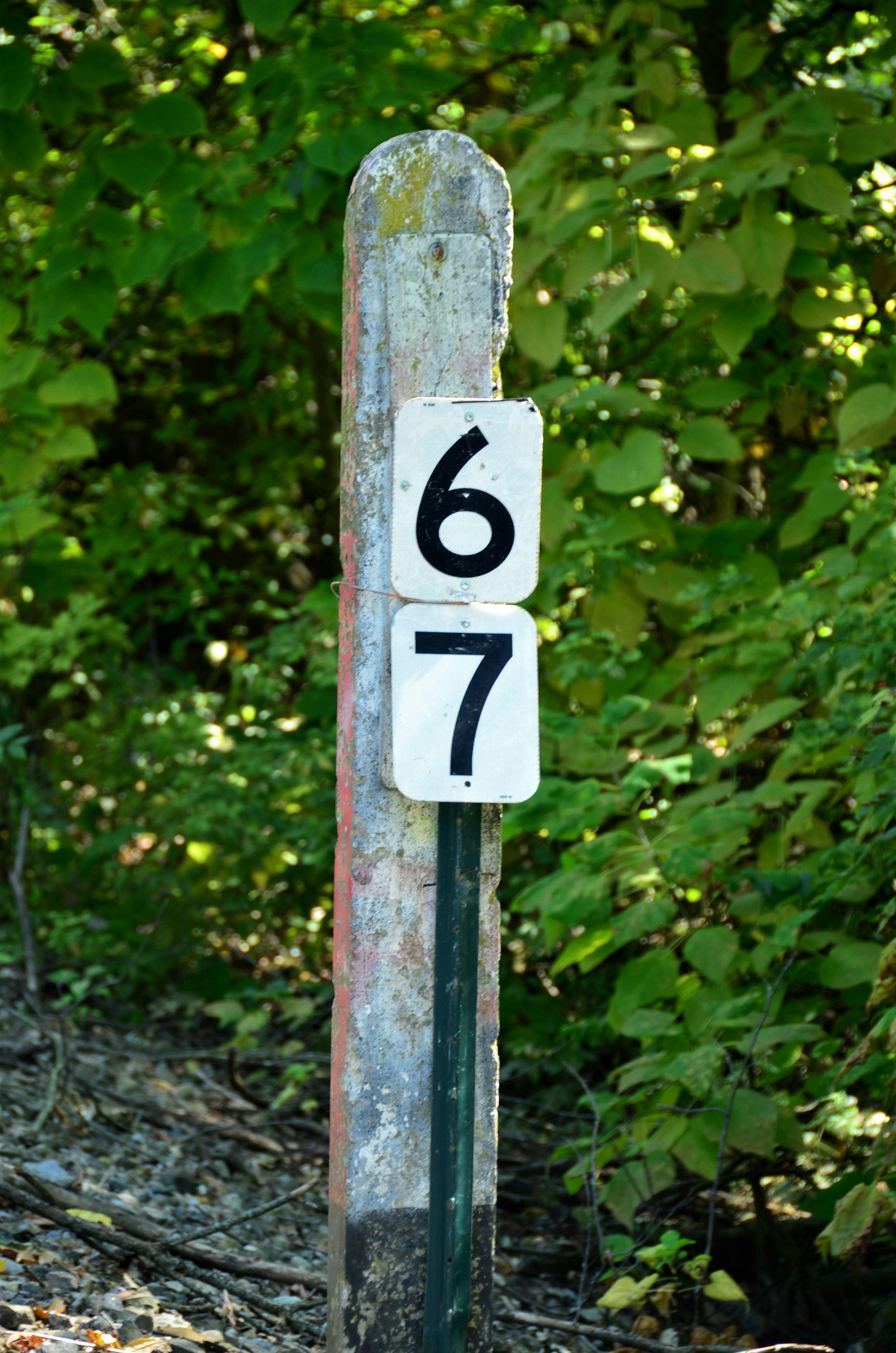 Railroad 67 mile marker sign