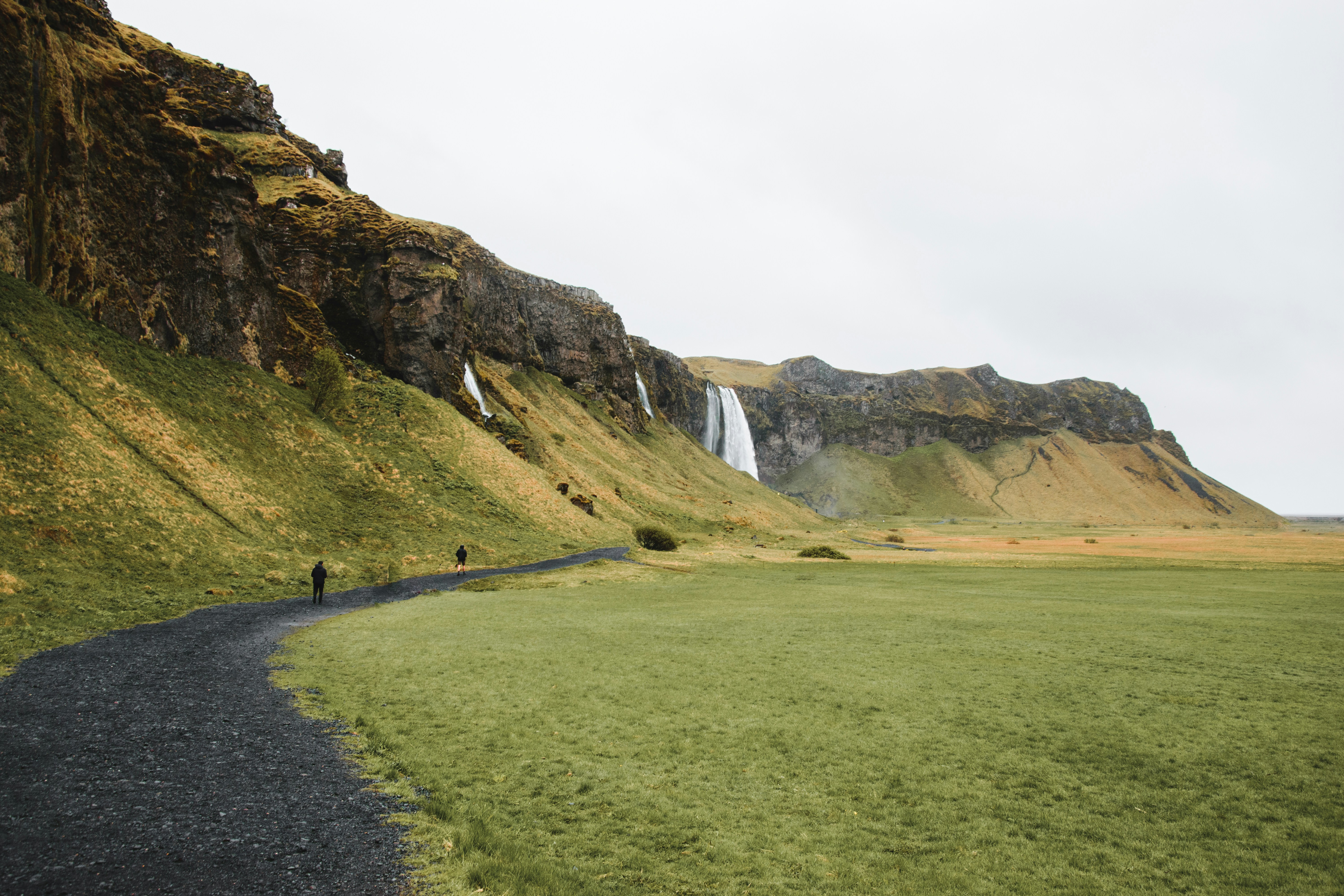 A path leading to a waterfall photo – Free Waterfall Image on Unsplash