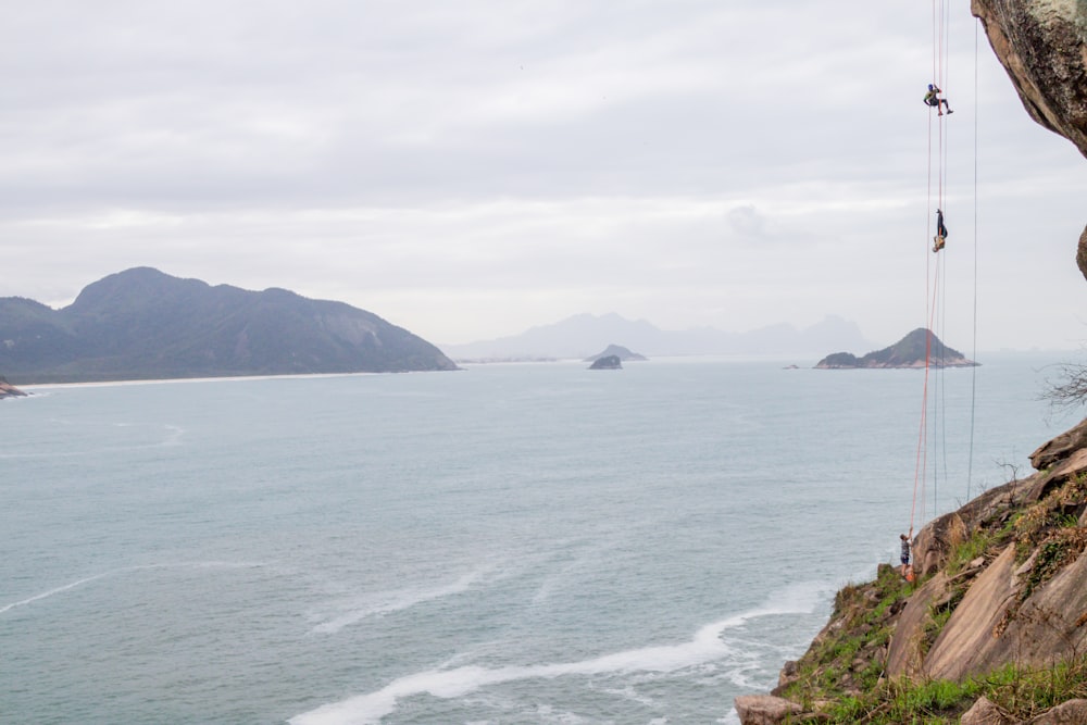 a body of water with land in the back