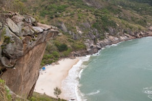 a beach with people on it
