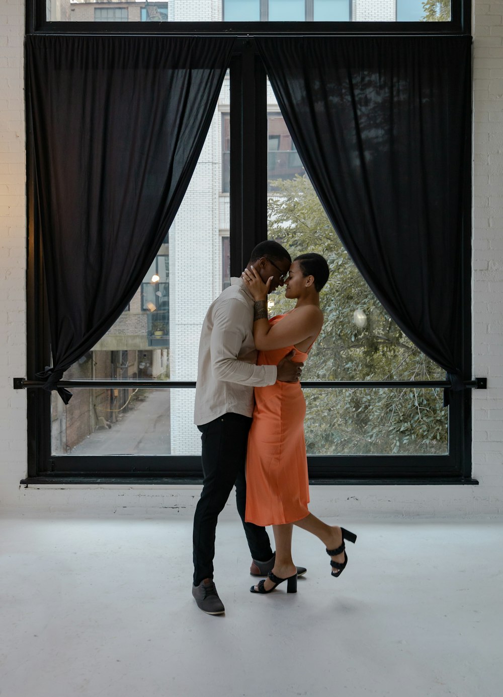 a man and woman kissing