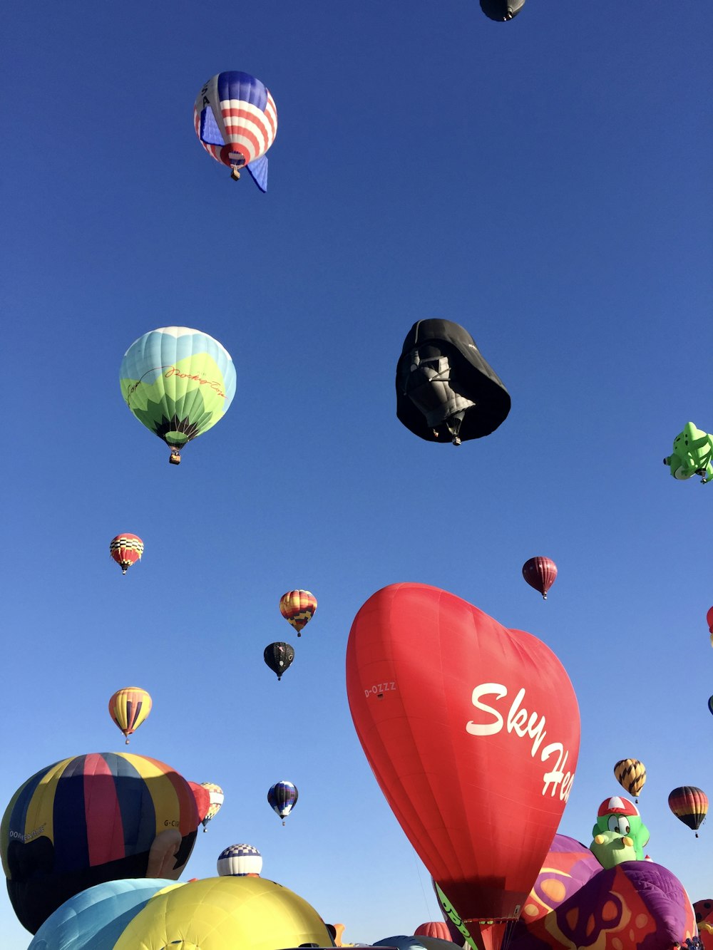 a group of hot air balloons in the sky