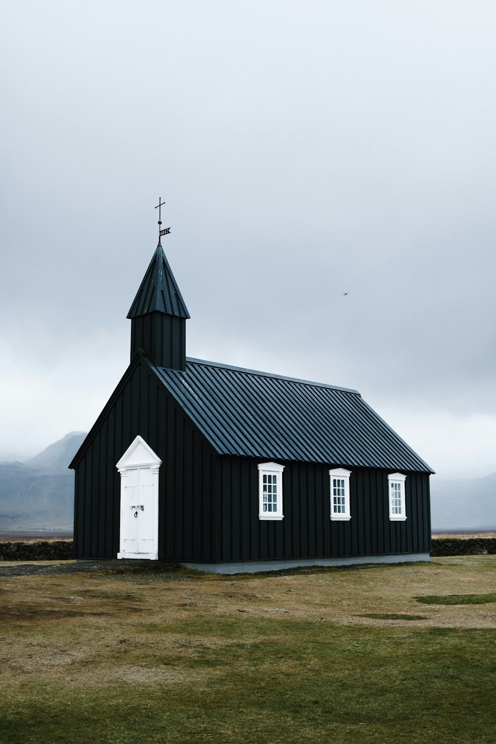 a small black building