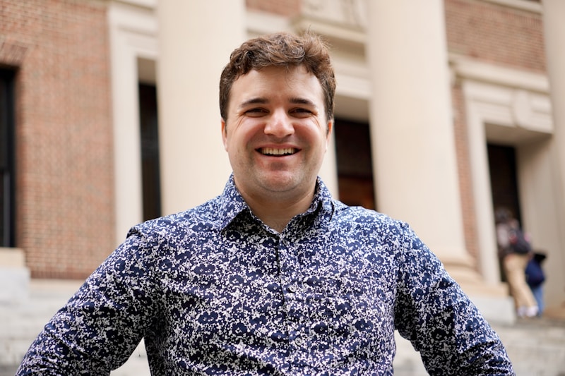 successful man smiling for Melbourne sugar daddy profile