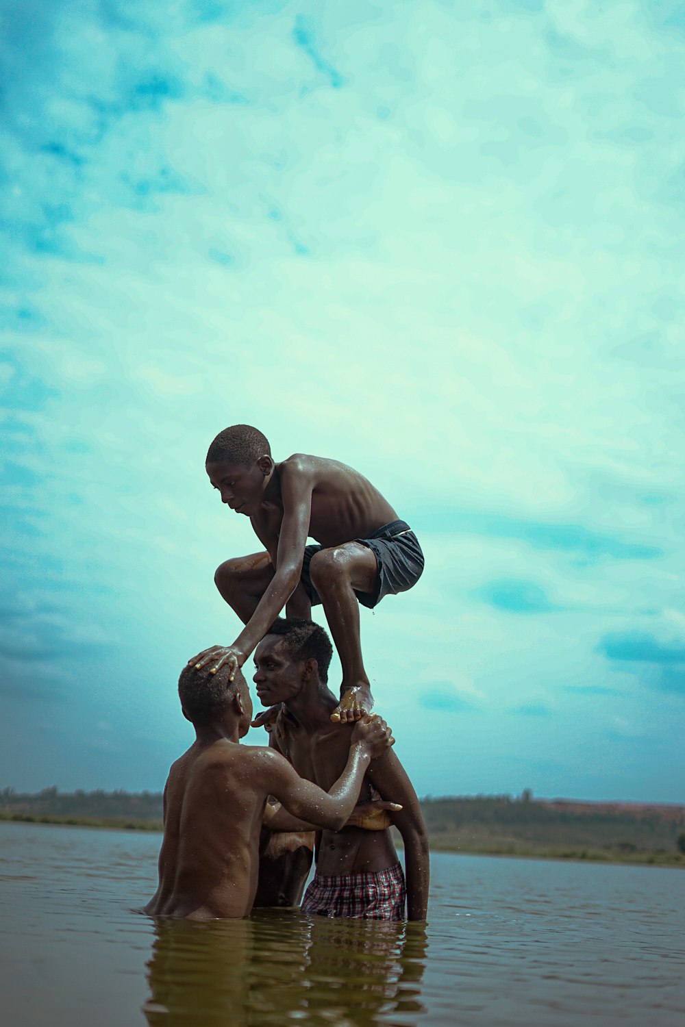 a group of people playing in water