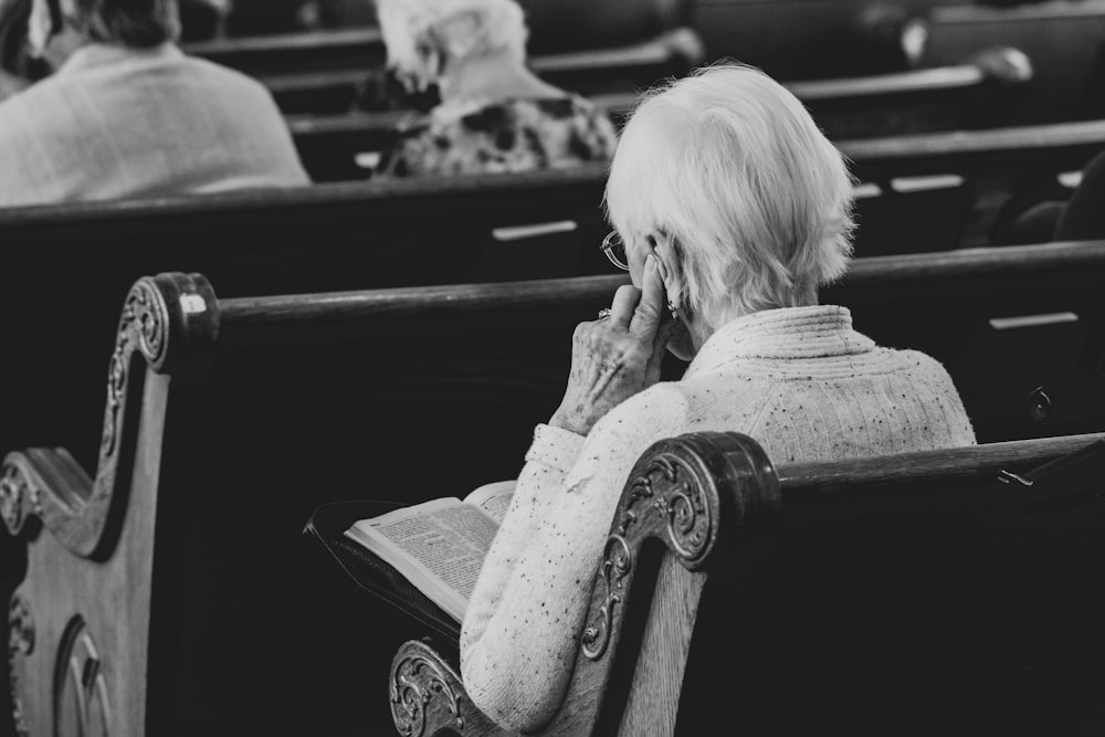 a person sits on a bench