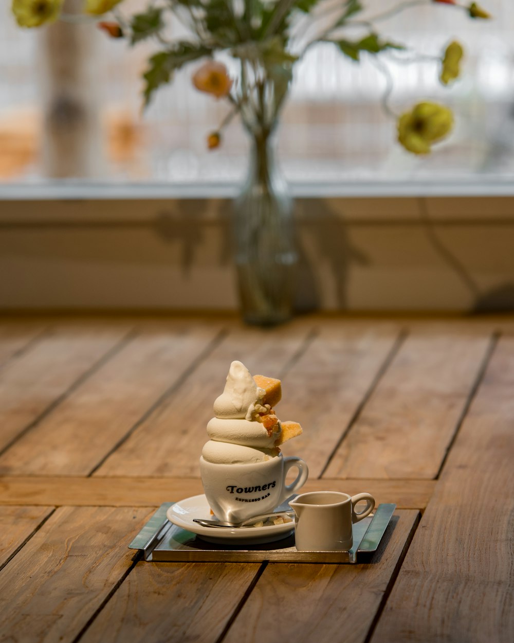 a cupcake on a saucer