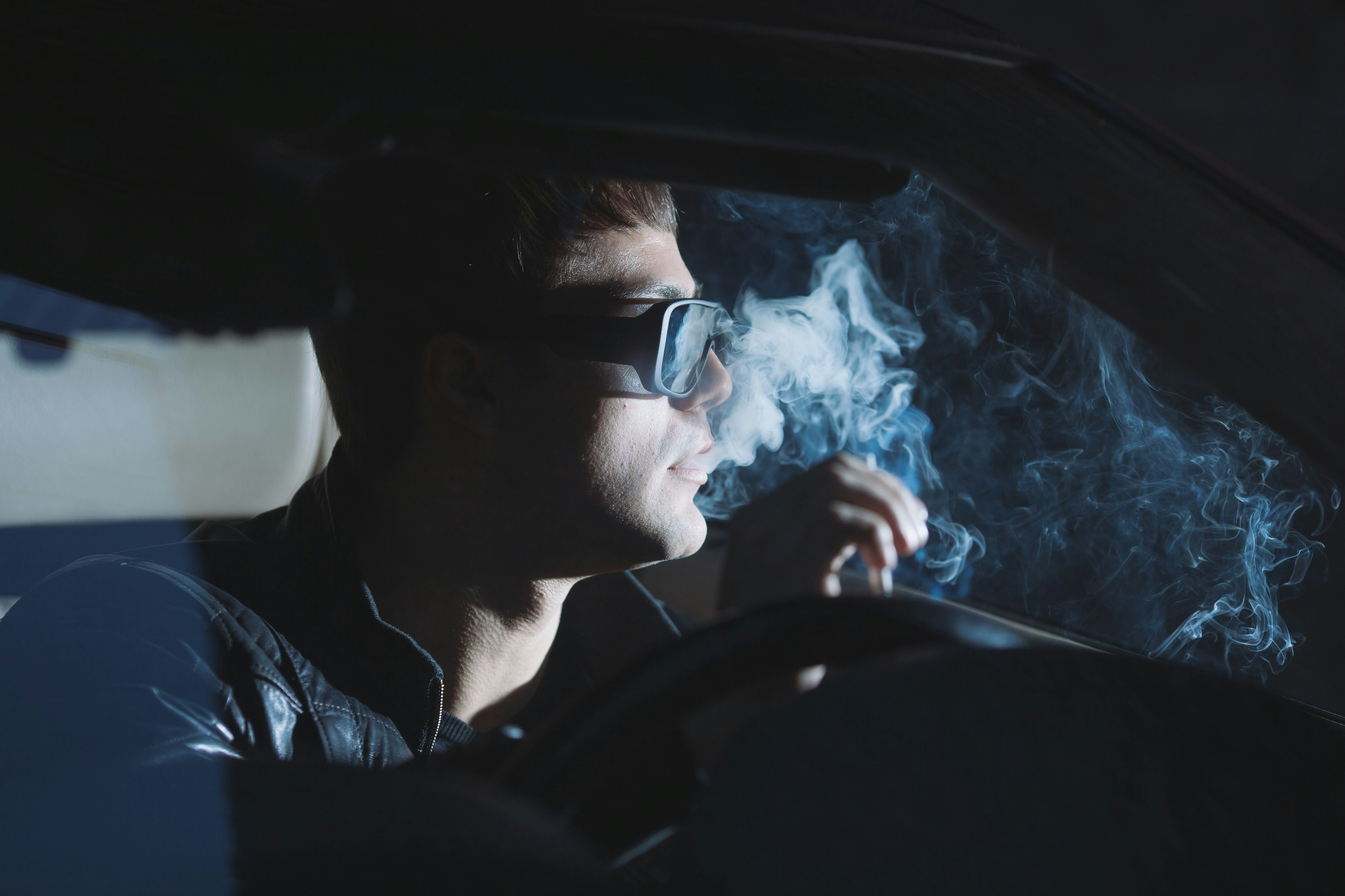 a man driving a car