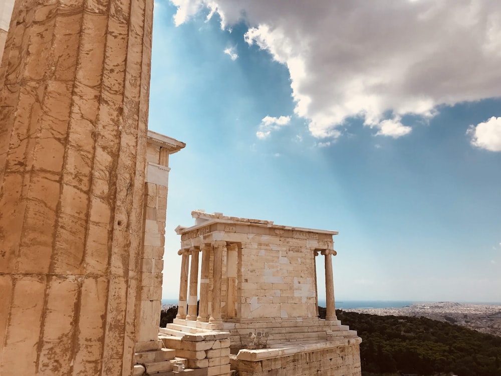 a building with columns and a blue sky