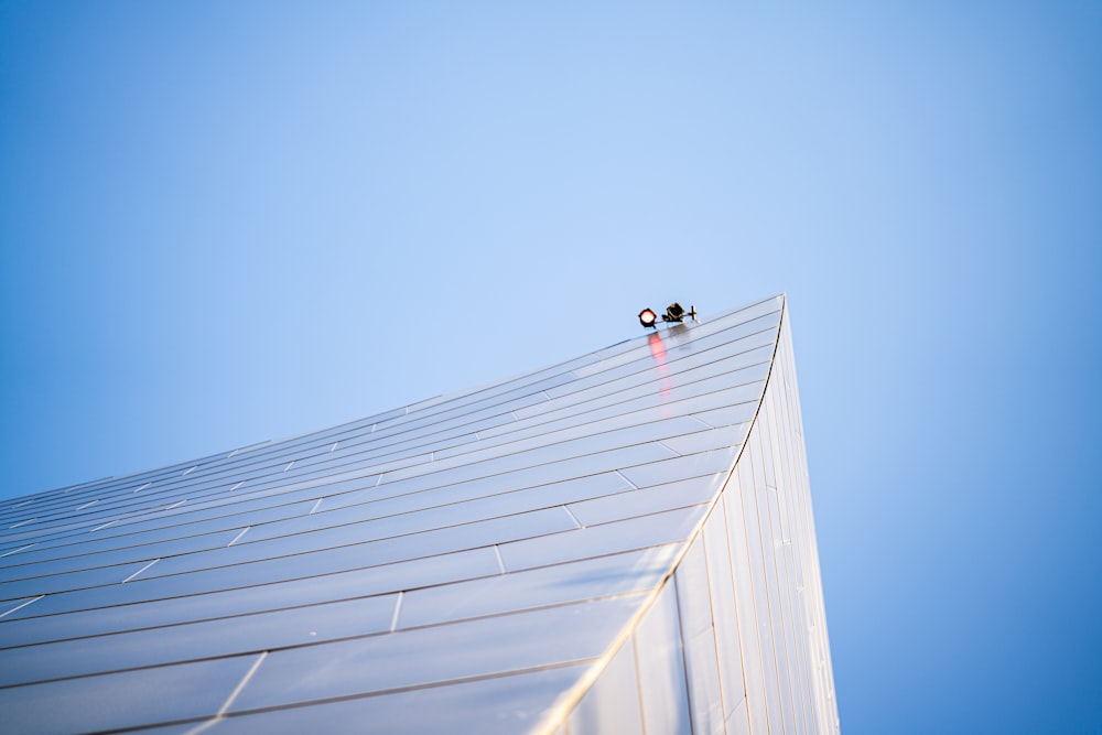 a group of people climbing a tall metal tower