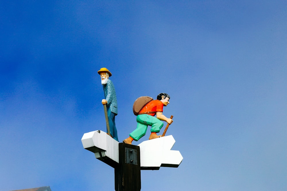 a man and a woman on a roof