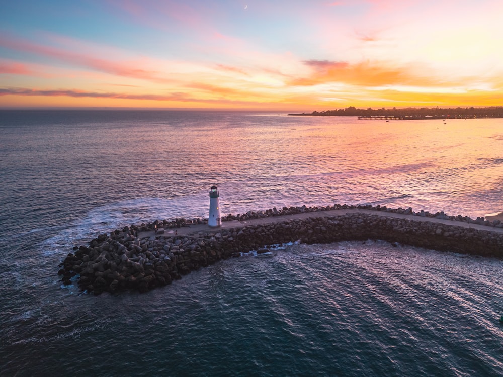 a lighthouse on a rocky shore