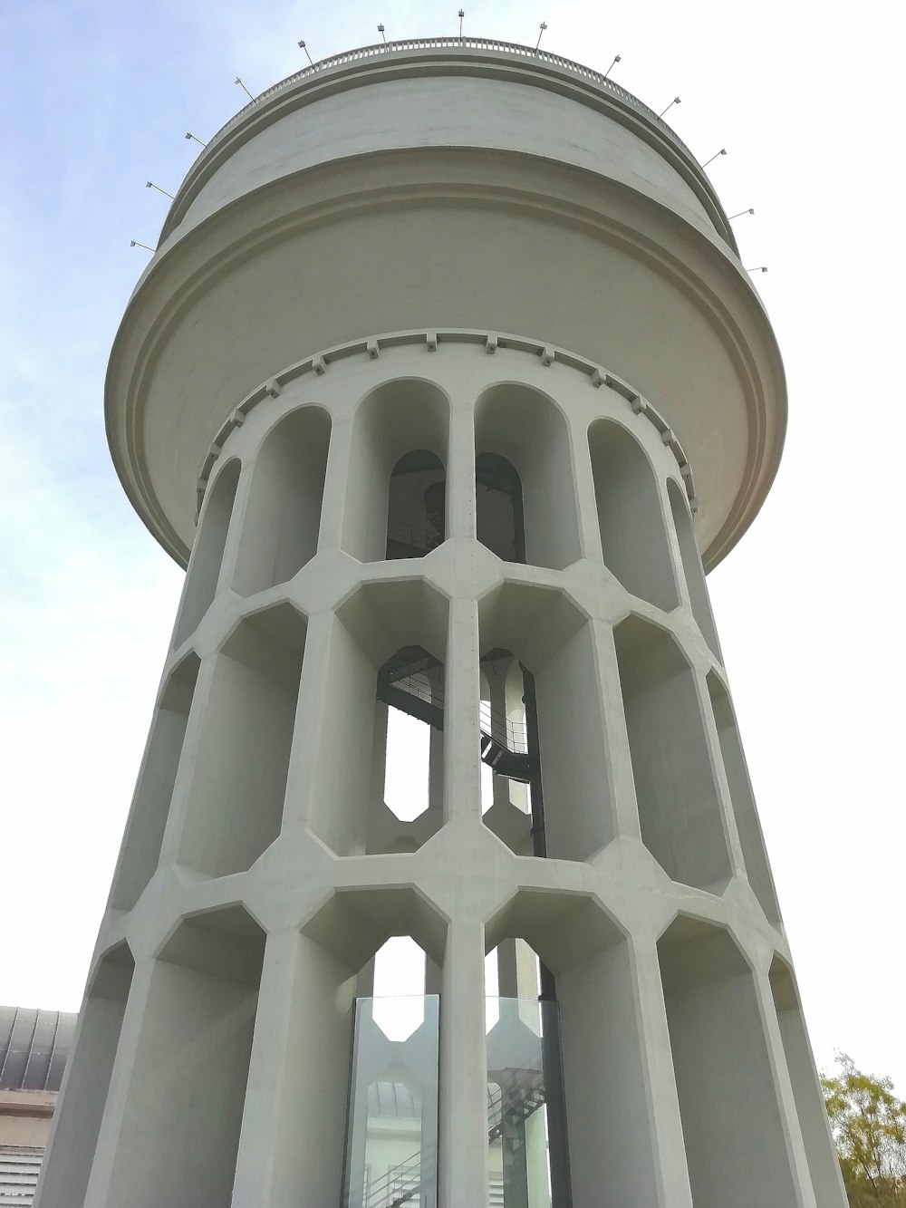 a white tower with a round top