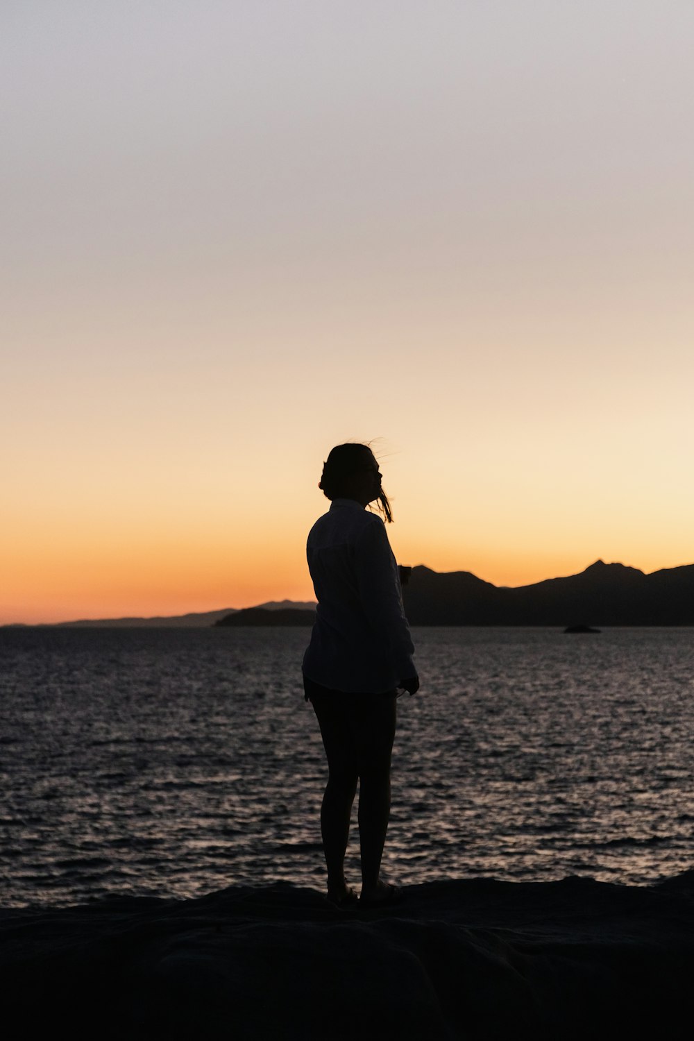 a person standing on a beach