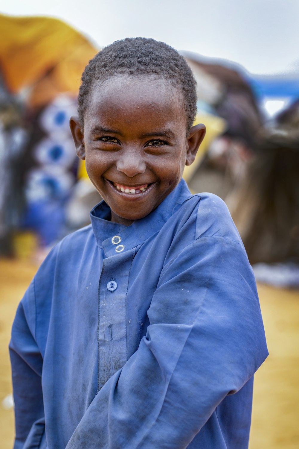 a young boy smiling